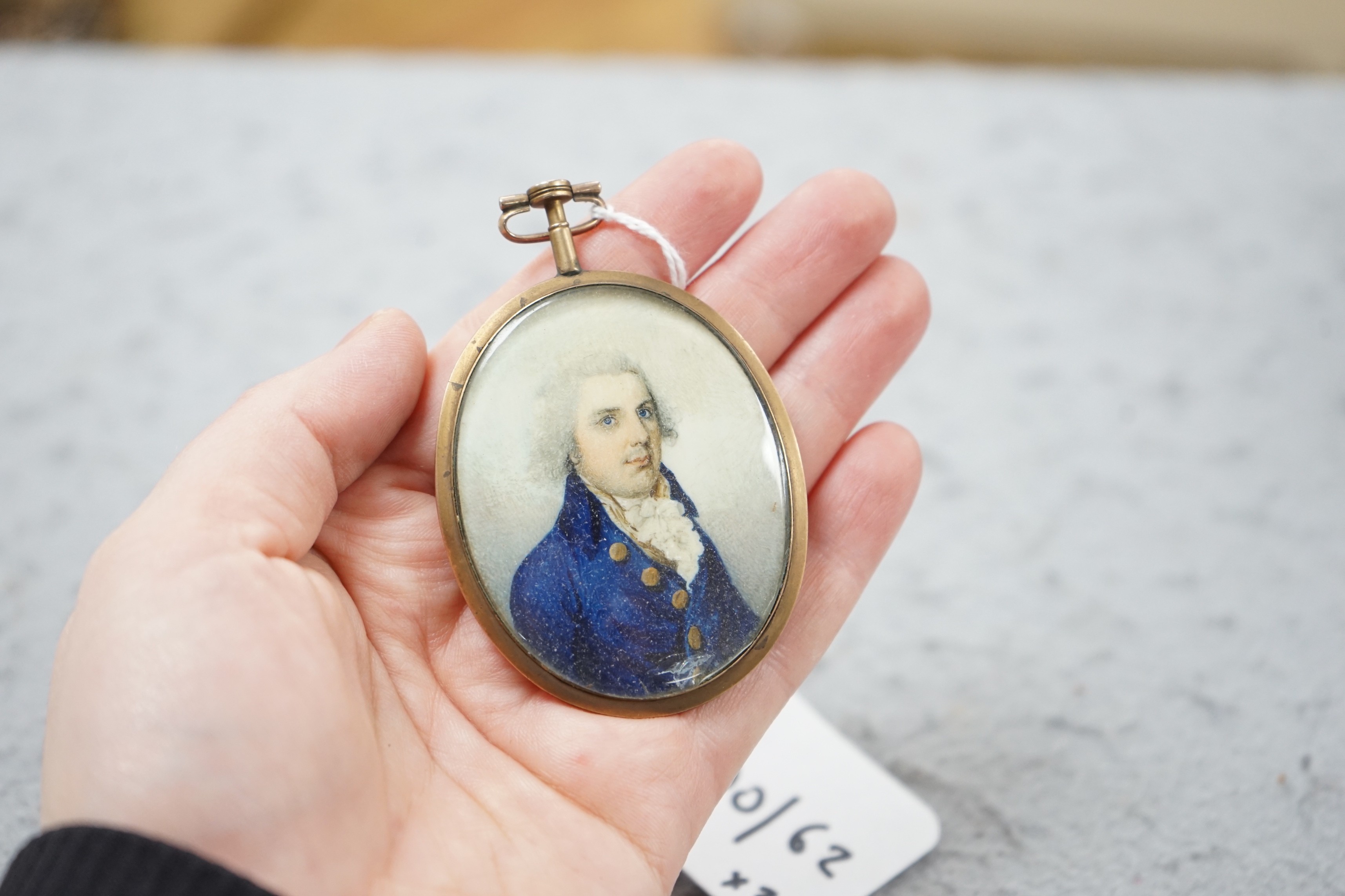 A selection of three watercolour portrait miniatures on ivory relating to the Potenger Family